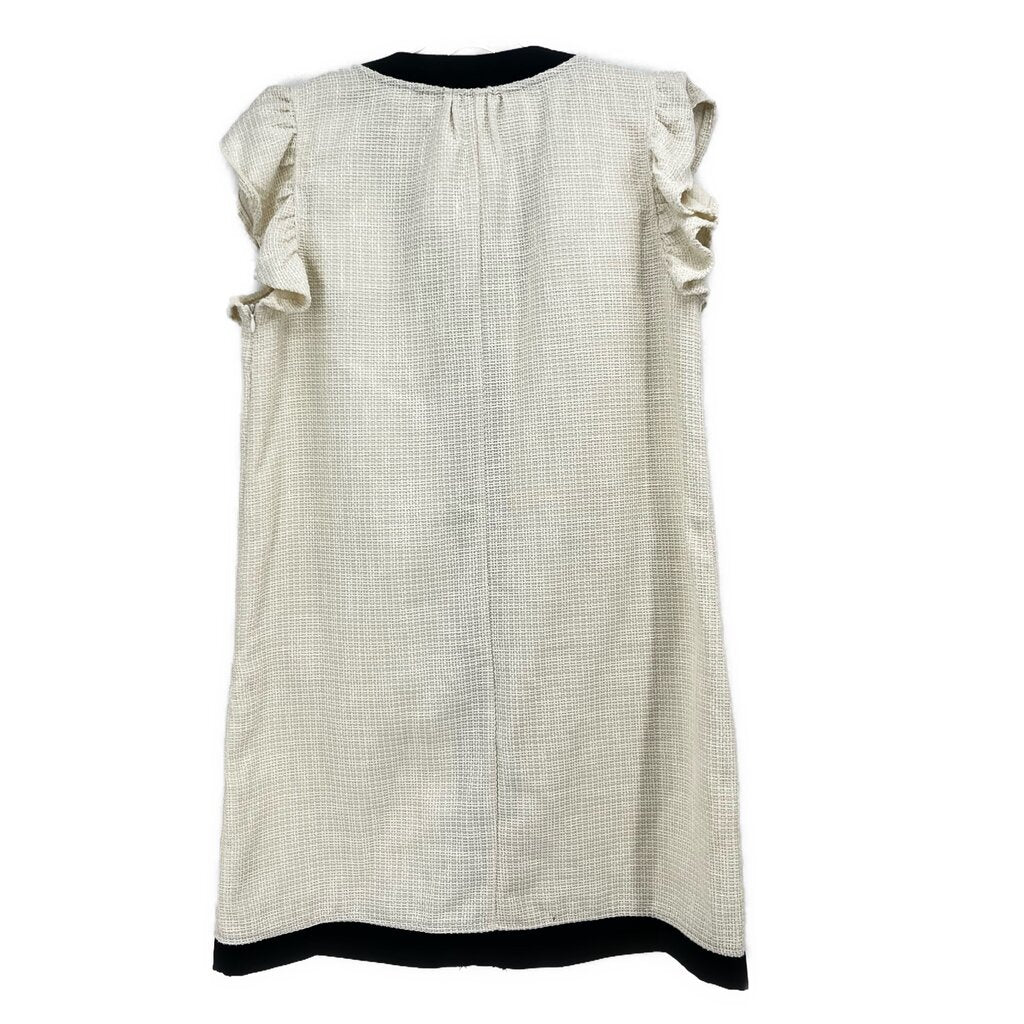 Cream button-up dress with ruffled shoulders and black-trim hem