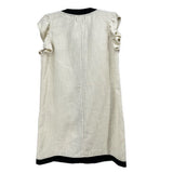 Cream button-up dress with ruffled shoulders and black-trim hem