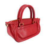 Red LOUIS VUITTON Dhanura PM crossbody bag angled view with side detailing and gold hardware