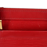 Close-up of red stitching and textured leather panel on DHANURA PM