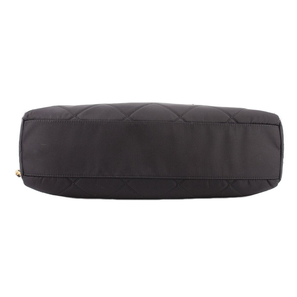 Black quilted tote bag base with stitched panel and smooth side wall