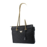 Black quilted tote bag with gold chain handles and PRADA triangular logo