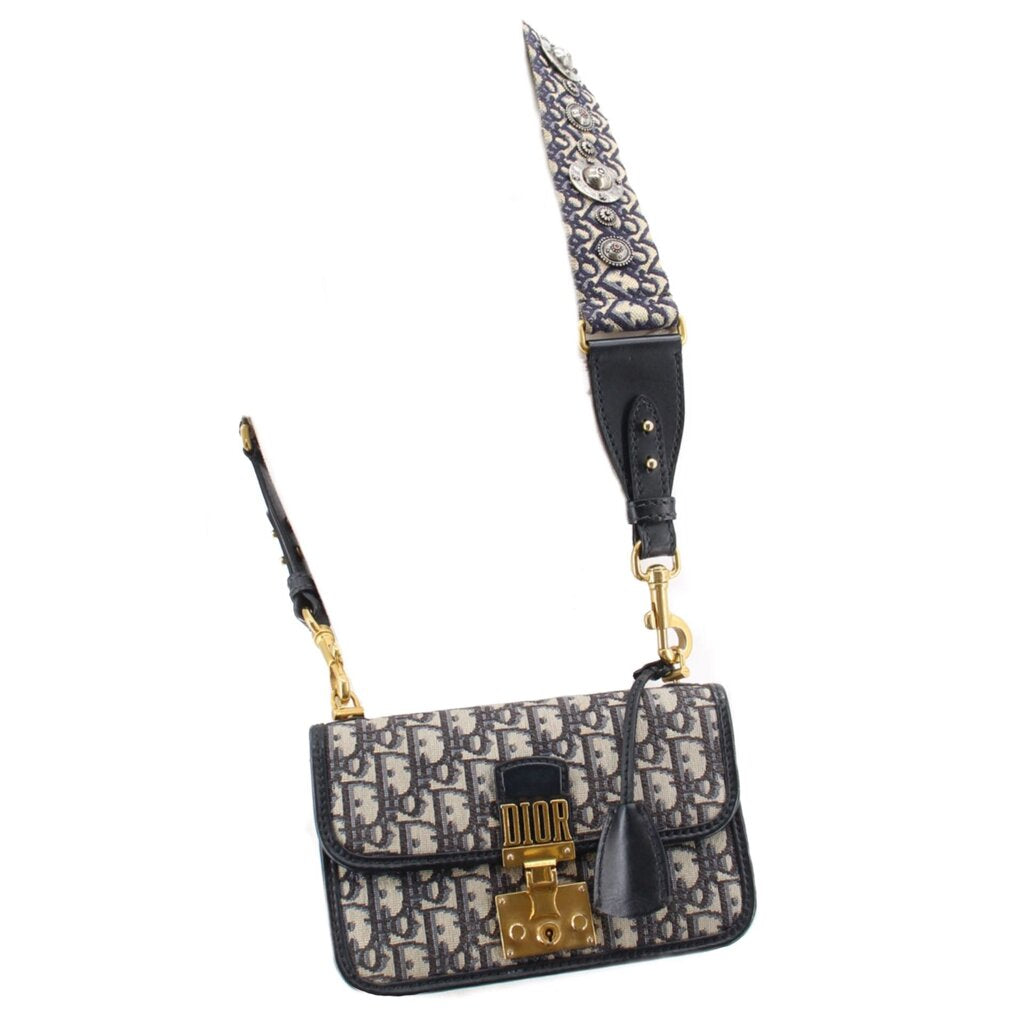 Blue Dior monogram flap crossbody bag with shoulder strap and gold-tone lock
