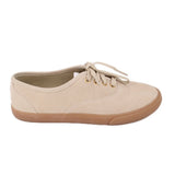 Beige suede sneakers, side view, lace-up with tan rubber sole
