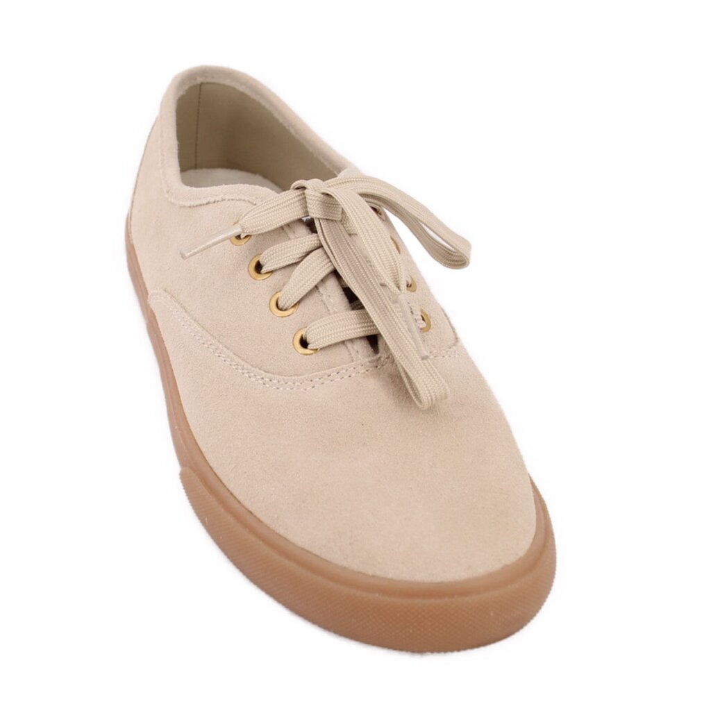 Beige suede lace-up sneakers with fabric laces and low-profile gum sole