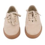Beige suede sneakers, front view, with beige laces and gum rubber sole