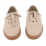 Beige suede sneakers, front view, with beige laces and gum rubber sole