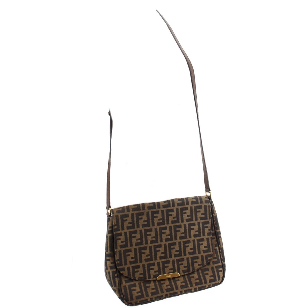 Zucca flap crossbody bag on shoulder, tobacco FF pattern with adjustable strap