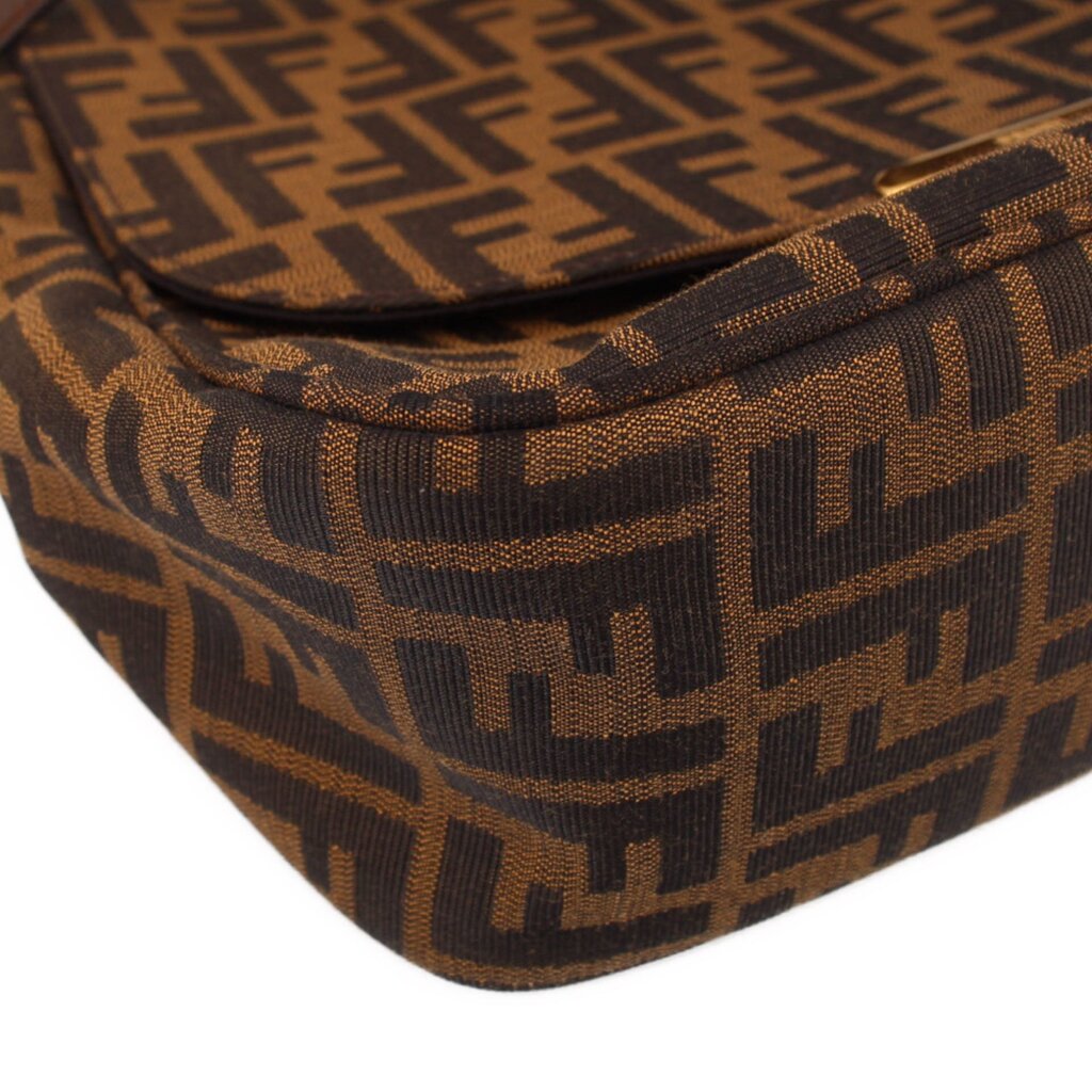 Zucca flap crossbody bag bottom close-up, tobacco FF pattern with trim edge