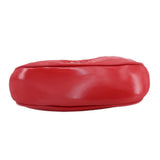 Red bottom view of small half-moon pochette with smooth glossy leather