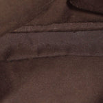 Dark fabric interior lining of cream Gucci bamboo shoulder bag, close-up
