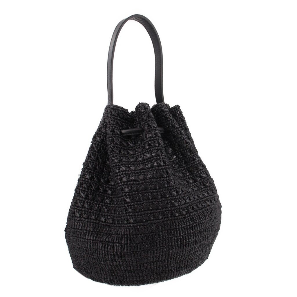 Black raffia bucket crossbody bag with black leather handles and drawstring