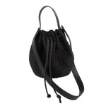 Black raffia crossbody bucket bag with drawstring top and black leather strap