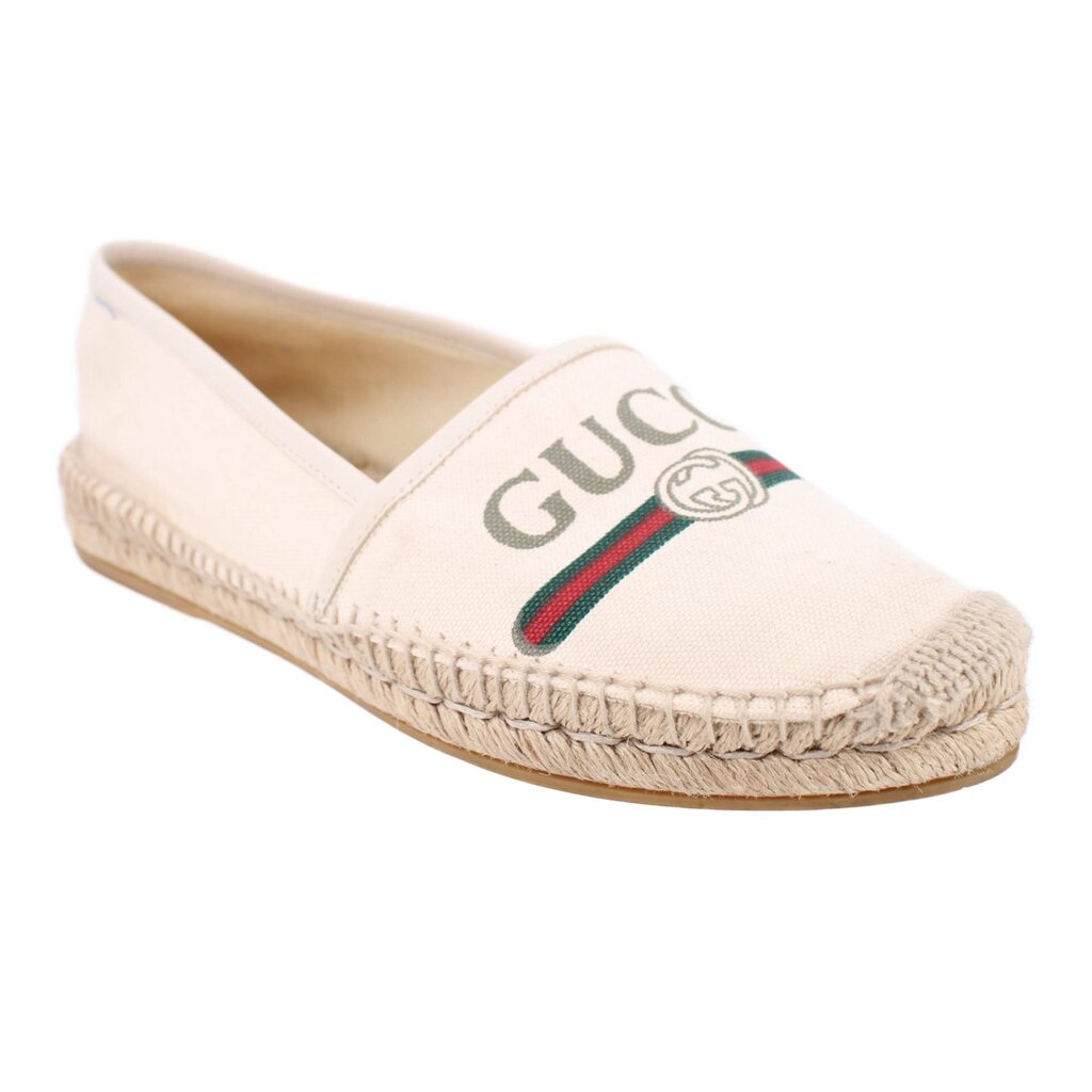 Cream canvas logo slip-on flats with espadrille jute midsole and Gucci Web stripe