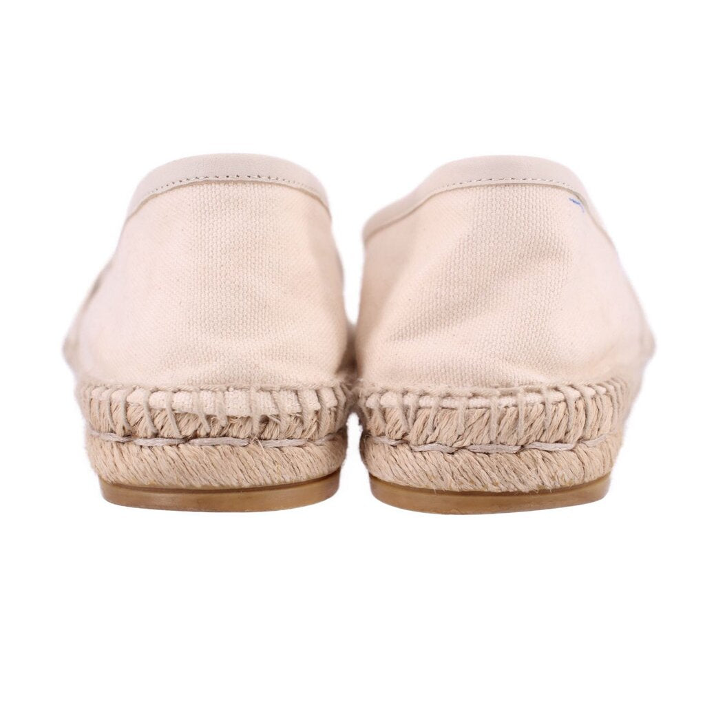 Cream canvas slip-on flats with espadrille jute trim, back view