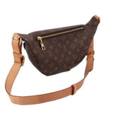 Monogram bumbag side view with front zipper and leather strap