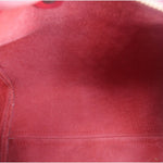 Red interior lining of a Speedy 25 crossbody bag