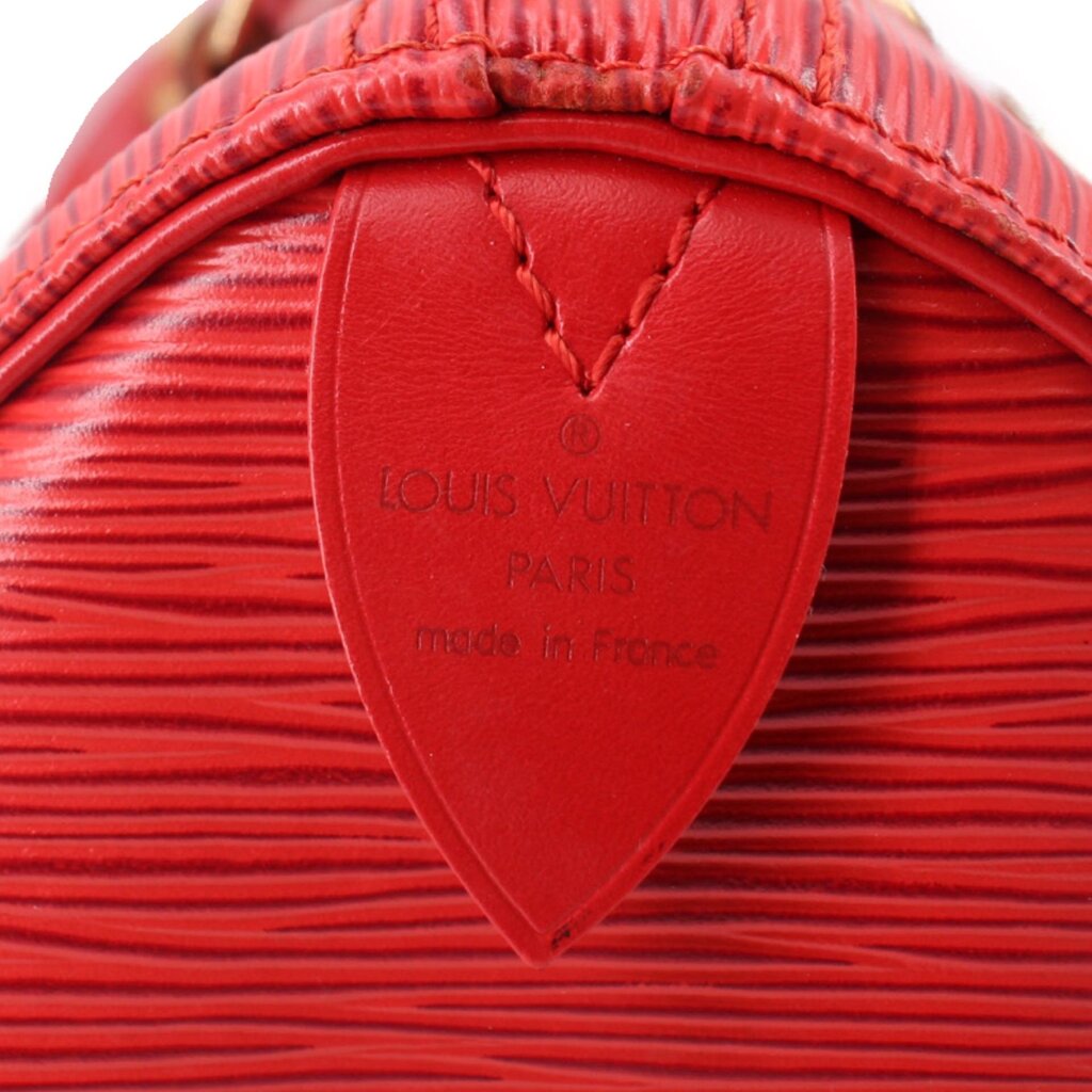 Red leather logo tag on Louis Vuitton Speedy 25 crossbody, "Louis Vuitton Paris"