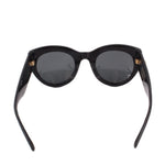 Black sunglasses front view with rounded cat-eye frames and dark lenses