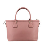 Blush leather zip-top satchel with two top handles and front hanging tab