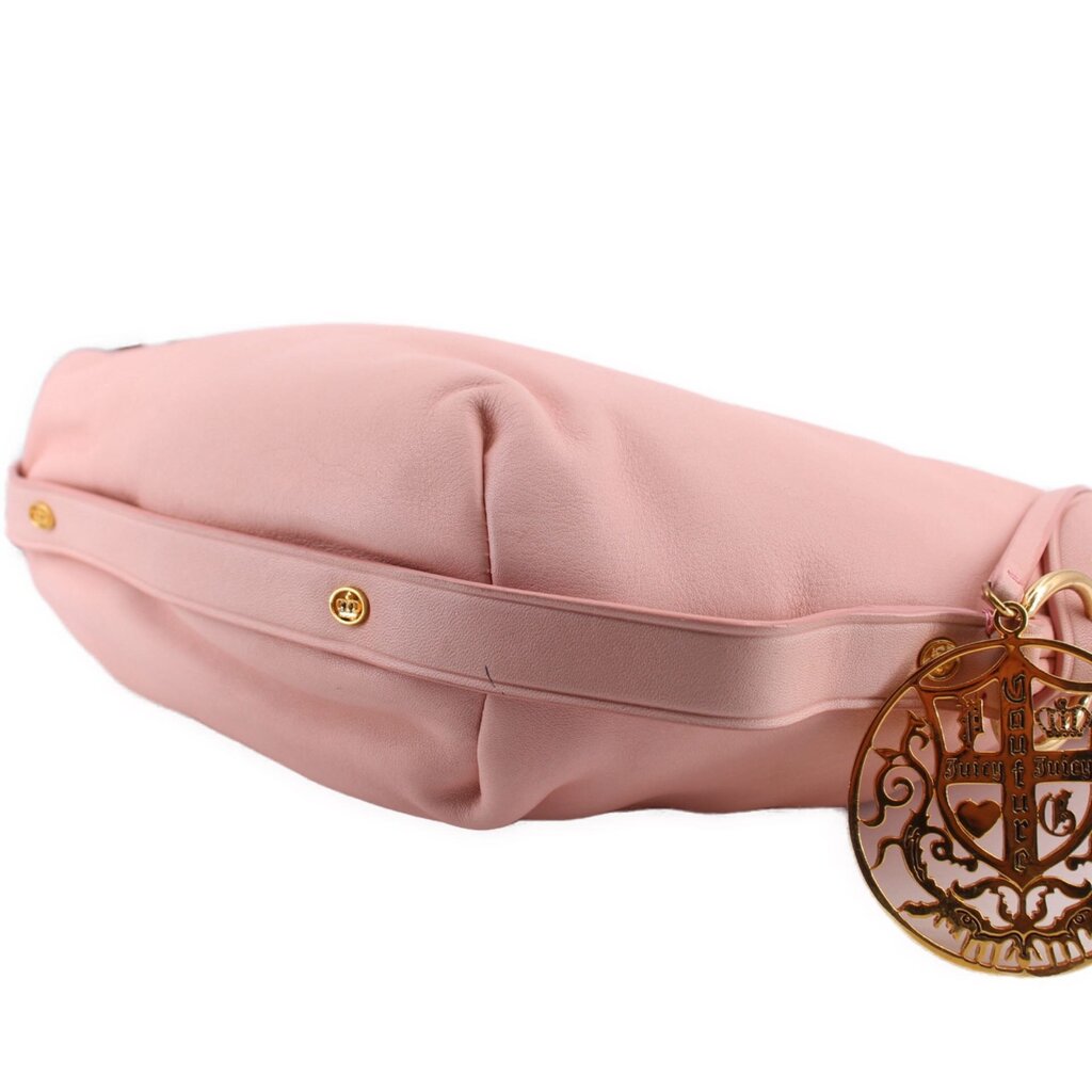Pink leather hobo bag with gold hardware and decorative charm