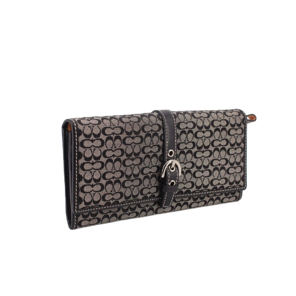 Black signature wallet foldover flap with center D-ring and snap closure