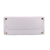White leather crossbody tote front panel with snap hardware and stitched seams
