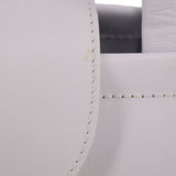 Close-up of stitched seam on white leather crossbody tote corner