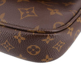 Close-up of brown monogram corner on Multi Pochette pouch with textured leather edge