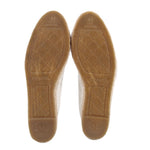 CHANEL espadrille flat outsoles with textured tread and CHANEL branding