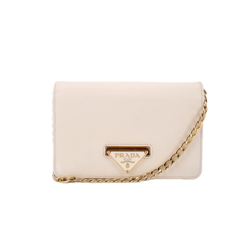 Cream Saffiano crossbody bag with gold chain and PRADA logo plaque