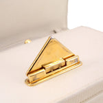 Gold-tone clasp on cream Saffiano crossbody bag