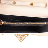 Cream Saffiano bag interior with black lining and gold zipper