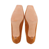 Camel suede mules showing soles and footbed lining