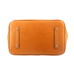 Back view of taupe Carissa satchel with tan leather trim and two hanging grommet tabs.