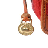 Gold padlock-style front clasp with tan leather strap on red crossbody bag