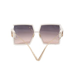 CHRISTIAN DIOR white sunglasses, front view with gold wire bridge and gradient lenses