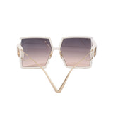 CHRISTIAN DIOR white sunglasses, front view with gold wire bridge and gradient lenses