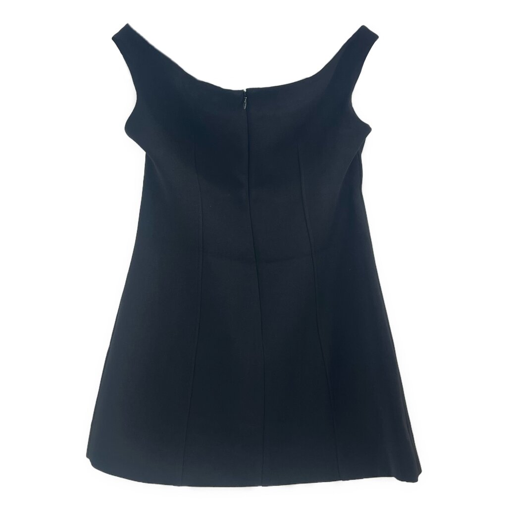 Black sleeveless top back view with center seam and zipper