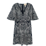 Black embroidered shift dress with white leaf pattern, short sleeves, crew neck