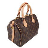 Louis Vuitton monogram crossbody bag, angled view with zipper top and tan trim