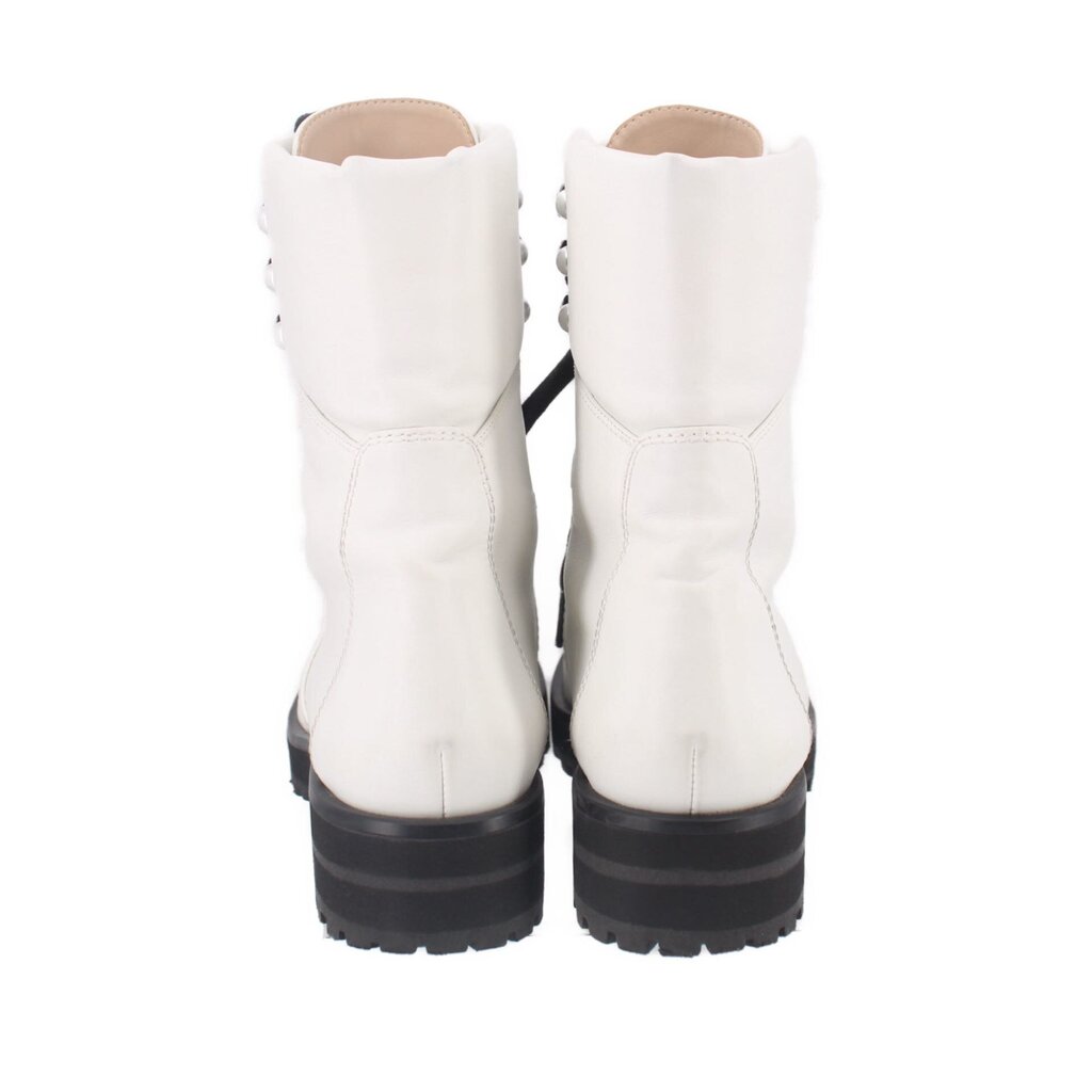 White lace-up boots with padded collars and black lug rubber soles