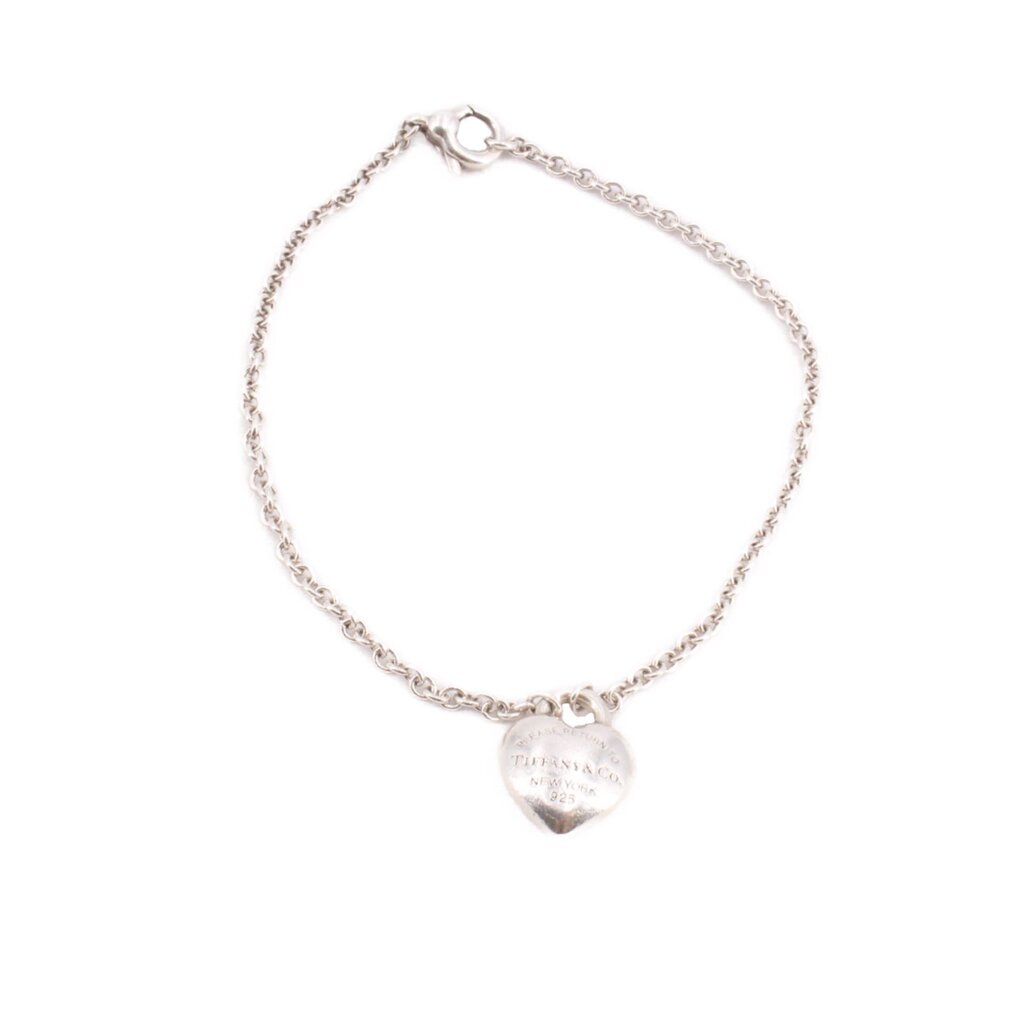 Silver heart charm bracelet with linked chain and small heart pendant