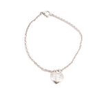 Silver heart charm bracelet with linked chain and small heart pendant