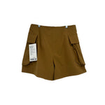 Camel cargo shorts with side flap pockets and visible size tag at left side