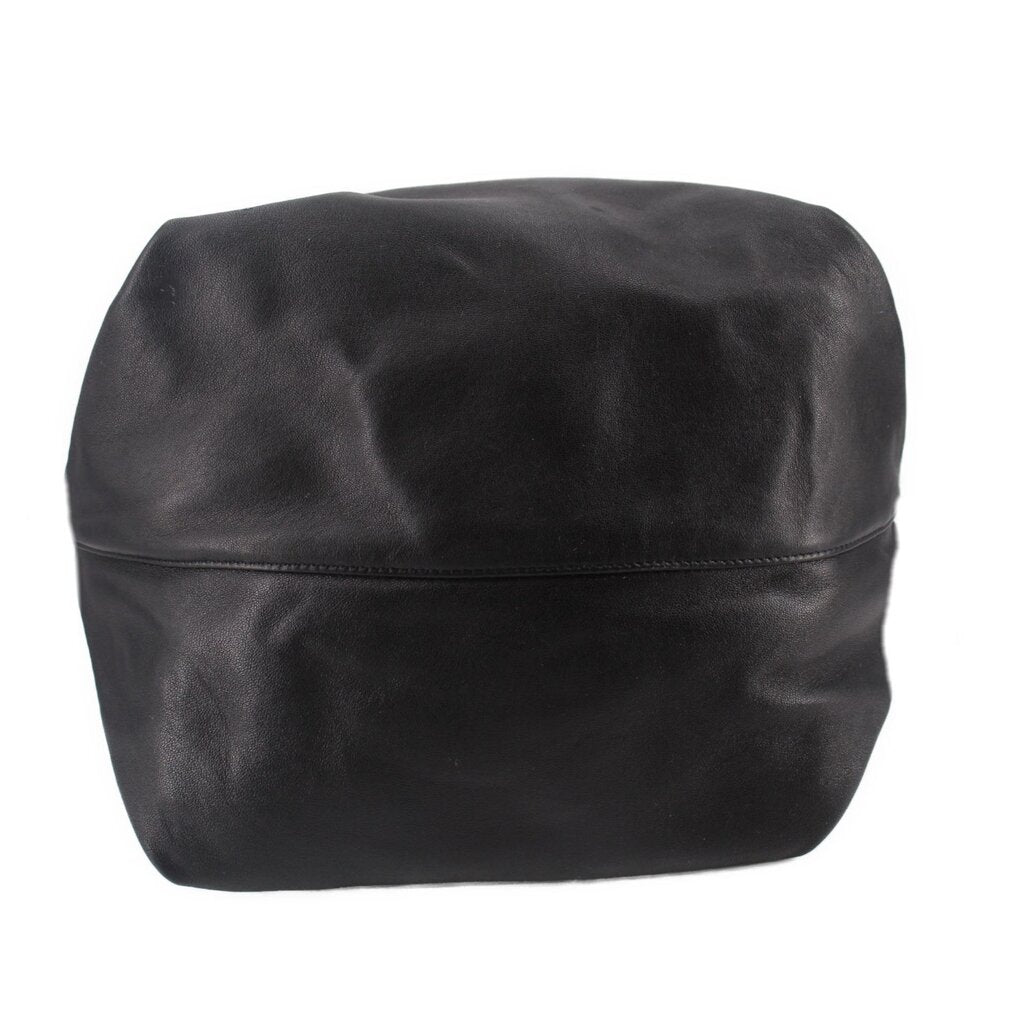 Black drawstring tote bag with rounded rectangular shape and front seam panel.
