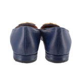 Back view of navy leather flats with low block heel
