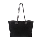 Black CHANEL tote bag with chain handles and minimal front design