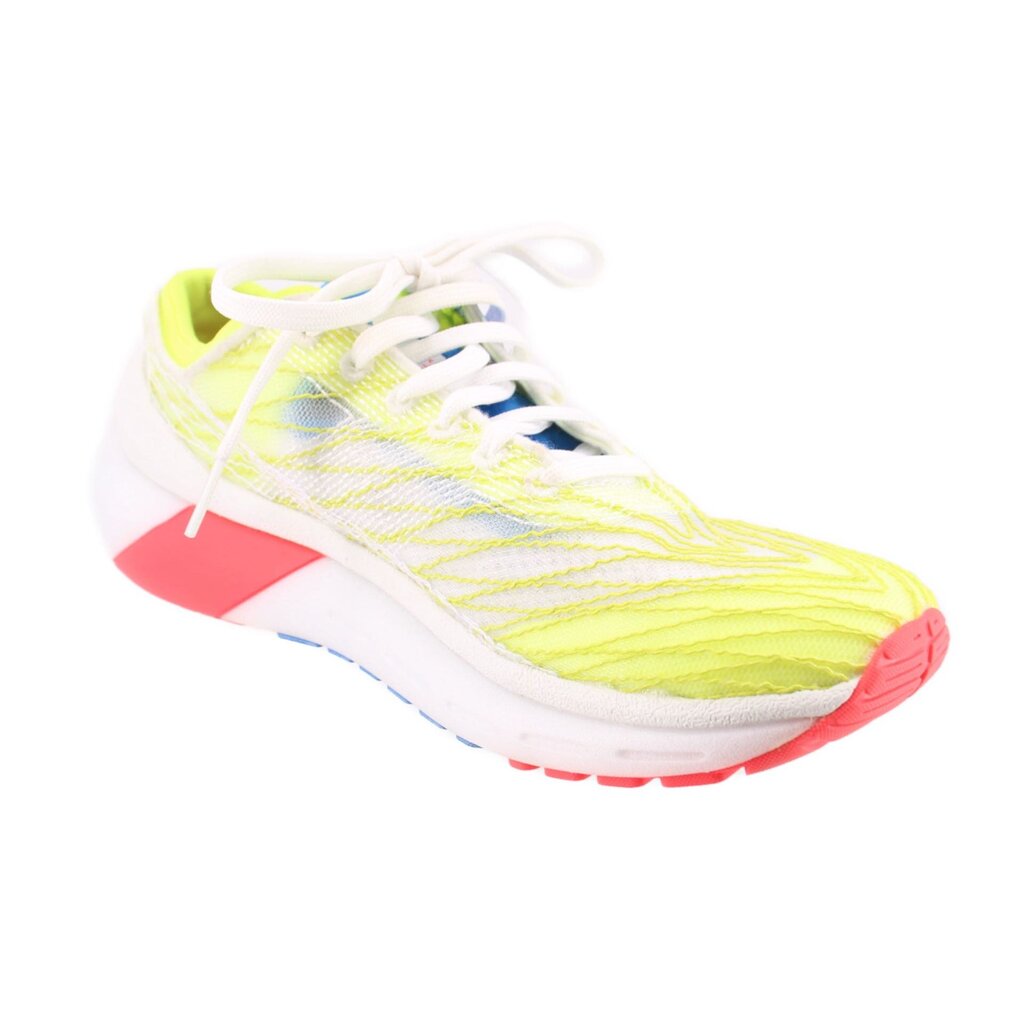 Yellow mesh sneakers with white laces and red heel accent
