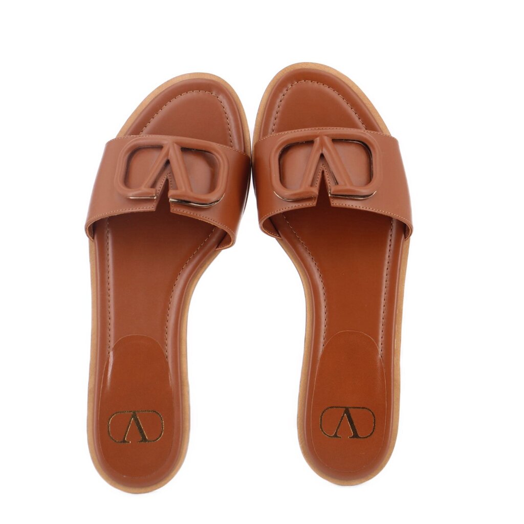 Brown front-view slide sandals with V logo buckle strap detail